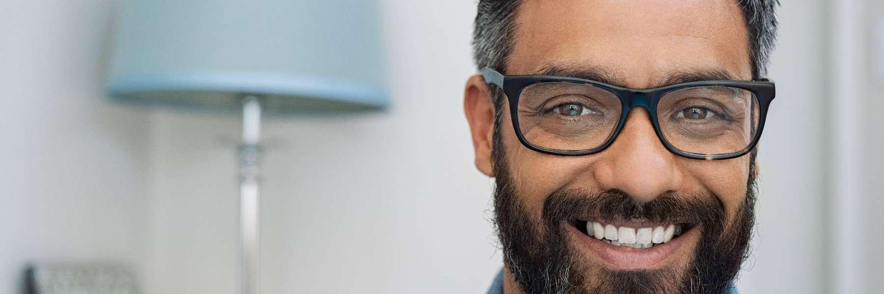 man with near sightedness in tweed heads