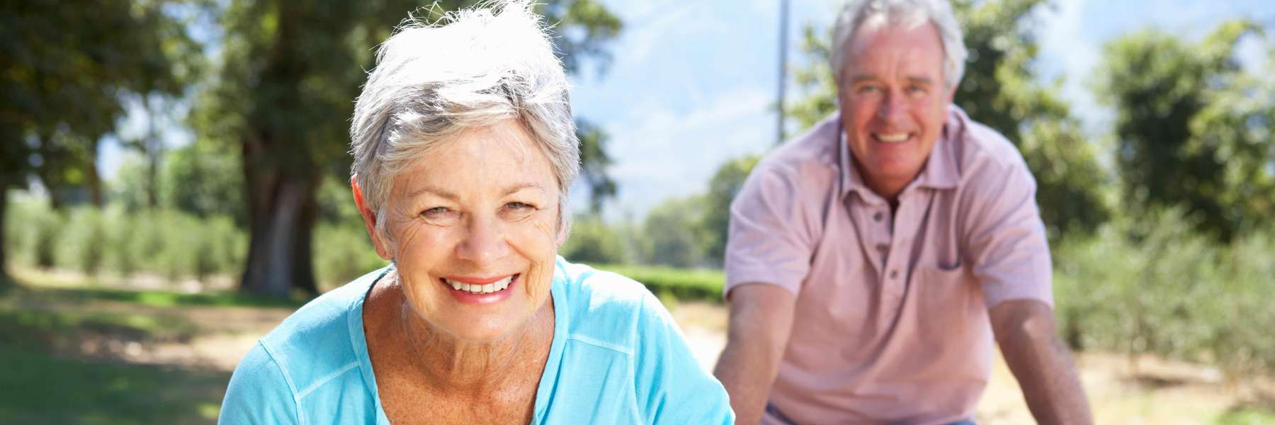 Couple riding bikes | Eye doctor gold coast
